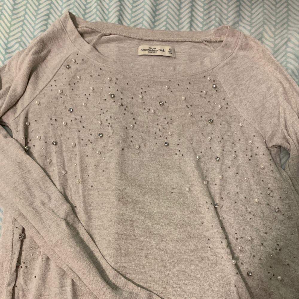 Long sleeved shirt with diamonds and pearls